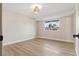 Bright, airy bedroom with a large window and neutral walls and modern floors at 4842 Plata Del Sol Dr, Las Vegas, NV 89121