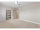 Bright bedroom featuring neutral walls, closet and plush carpet at 4842 Plata Del Sol Dr, Las Vegas, NV 89121