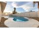 An inviting backyard pool area with a covered patio, perfect for outdoor enjoyment at 4842 Plata Del Sol Dr, Las Vegas, NV 89121