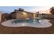 A private backyard oasis featuring a kidney-shaped pool and low maintenance landscaping at 4842 Plata Del Sol Dr, Las Vegas, NV 89121