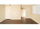 Bedroom with hardwood floors, fresh paint, and a walk-in closet at 5000 Indian River Dr # 475, Las Vegas, NV 89103