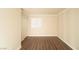 Comfortable bedroom with fresh paint, new flooring and natural light from a window at 5000 Indian River Dr # 475, Las Vegas, NV 89103