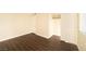 Comfortable bedroom with hardwood floors, closet, and a view to the exterior at 5000 Indian River Dr # 475, Las Vegas, NV 89103