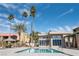 This is a full view of the pool in a condo complex with palm trees in the background at 5000 Indian River Dr # 475, Las Vegas, NV 89103