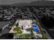 High-definition aerial view of property highlighting the backyard sports court, pool, and attractive landscaping at 6214 Ebony Legends Ave, Las Vegas, NV 89131