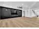 Spacious living room boasts recessed lighting, contemporary fireplace, and sleek flooring perfect for entertaining at 6214 Ebony Legends Ave, Las Vegas, NV 89131