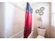Bathroom features a shower-tub combo and tasteful decor at 6487 W Levi Ave, Las Vegas, NV 89141
