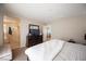 This bedroom offers an attached bathroom, neutral paint and carpeted floors at 6487 W Levi Ave, Las Vegas, NV 89141