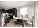 Cozy breakfast nook featuring a dining table and chairs next to the kitchen at 6487 W Levi Ave, Las Vegas, NV 89141