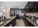 Spacious kitchen with granite countertops and ample cabinetry at 6487 W Levi Ave, Las Vegas, NV 89141