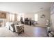 Cozy living area with stylish seating, a media center, and trendy decor accents at 6487 W Levi Ave, Las Vegas, NV 89141