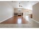 Open-concept living room with vaulted ceilings, built-in shelves, and a seamless flow to the kitchen at 8034 Villa Armando St, Las Vegas, NV 89131