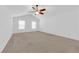 The main bedroom is spacious and bright with carpet at 8036 Maple Park St, Las Vegas, NV 89131