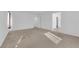 Spacious bedroom with carpeted floors and large windows at 8036 Maple Park St, Las Vegas, NV 89131
