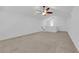 Bonus room features carpeting, vaulted ceiling, and ceiling fan at 8036 Maple Park St, Las Vegas, NV 89131