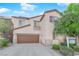 Two-story home featuring a two-car garage and manicured landscaping at 8036 Maple Park St, Las Vegas, NV 89131