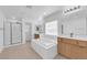 Bright main bathroom with tub, shower, and dual sinks at 8036 Maple Park St, Las Vegas, NV 89131