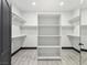 Walk-in closet featuring shelving and mirrored door at 8112 Golfers Oasis Dr, Las Vegas, NV 89149