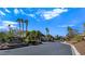 Gated community entrance, featuring lush landscaping and stone accents, ensuring privacy and security at 8112 Golfers Oasis Dr, Las Vegas, NV 89149