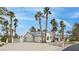 A spacious home features a wide driveway leading to an attached two-car garage at 8112 Golfers Oasis Dr, Las Vegas, NV 89149