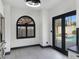 Kitchen leads to an outdoor pool through French doors at 8112 Golfers Oasis Dr, Las Vegas, NV 89149
