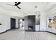 Bright living room with fireplace, wet bar, and windows at 8112 Golfers Oasis Dr, Las Vegas, NV 89149