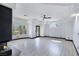 Spacious living room features a fireplace, expansive windows, and modern design at 8112 Golfers Oasis Dr, Las Vegas, NV 89149