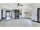 Bright living room with fireplace, wet bar, and windows at 8112 Golfers Oasis Dr, Las Vegas, NV 89149