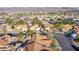 Scenic aerial view of a residential community with well-maintained homes and mountain views at 819 Teal Wing Way, Henderson, NV 89002