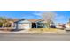 Charming single-story home featuring a well-maintained lawn, desert landscaping, and a two-car garage at 819 Teal Wing Way, Henderson, NV 89002