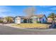 Charming single-story home featuring a well-maintained lawn, desert landscaping, and a two-car garage at 819 Teal Wing Way, Henderson, NV 89002