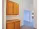Hallway with built-in cabinet storage leading to the living spaces at 819 Teal Wing Way, Henderson, NV 89002