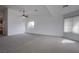 Bright and airy living room with neutral carpet and lots of natural light at 819 Teal Wing Way, Henderson, NV 89002