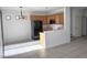 Spacious kitchen with eat-in dining area, oak cabinets and modern appliances at 8301 Strawberry Spring St, Las Vegas, NV 89143