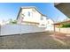 Fenced backyard features gravel landscaping, a covered patio, and a clear view of the home's rear exterior at 9092 Sosa Creek Ave, Las Vegas, NV 89149