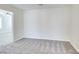 Bedroom with neutral carpet, light-colored walls, and plenty of natural light at 9092 Sosa Creek Ave, Las Vegas, NV 89149