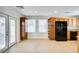 Bright kitchen featuring stainless steel appliances, lots of windows, and ample cabinet space at 9092 Sosa Creek Ave, Las Vegas, NV 89149