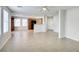 The living room features tile flooring and leads to the kitchen at 9092 Sosa Creek Ave, Las Vegas, NV 89149