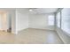 Bright living room has tile floors, a staircase, and lots of natural light at 9092 Sosa Creek Ave, Las Vegas, NV 89149