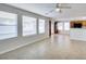 Living room leads to the kitchen and breakfast bar at 9092 Sosa Creek Ave, Las Vegas, NV 89149