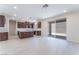 Modern kitchen featuring dark wood cabinets, stainless steel appliances, and an open layout at 9333 Observatory St, Las Vegas, NV 89143