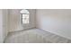 Bright bedroom with neutral carpet and a window offering natural light at , Las Vegas, NV 89130