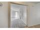 View of a bedroom with neutral carpet, ceiling fan, and large windows at , Las Vegas, NV 89130
