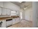 Well-lit kitchen with stainless steel appliances and tile flooring at , Las Vegas, NV 89130