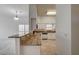 View of the kitchen with white cabinets and granite countertops at , Las Vegas, NV 89130
