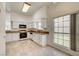 Bright kitchen with granite counters, white cabinets, and stainless steel appliances offers a functional cooking space at , Las Vegas, NV 89130