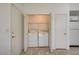 Conveniently located laundry area featuring a full-size washer and dryer tucked into a closet at , Las Vegas, NV 89130