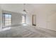 Large main bedroom with natural light, fan, and access to ensuite bathroom and walk-in closet at , Las Vegas, NV 89130