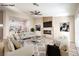 Bright and airy living room featuring modern fireplace and comfortable seating arrangement at 10205 Birch Bluff Ln, Las Vegas, NV 89145