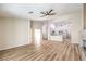 Open living space showcasing stylish hardwood floors and a seamless flow into the kitchen at 10205 Birch Bluff Ln, Las Vegas, NV 89145